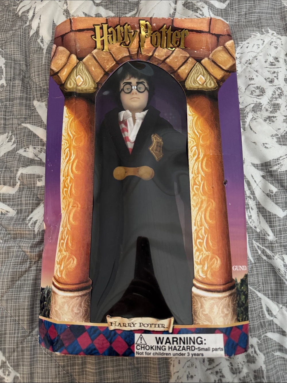 Warner Bros. Harry Potter Doll in Black Robe with Purple & Gold Box Accents